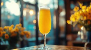A glass of beer on a table photo