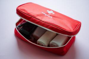A compact and portable Red First Aid Kit is essential for ensuring emergency preparedness, promoting home safety, and providing necessary healthcare support when needed photo