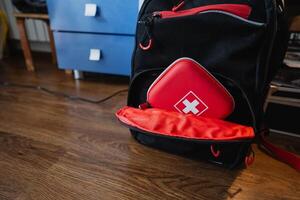 A Compact First Aid Kit that is Ready for Emergencies Conveniently Sized for Easy Storage in a Backpack, Perfect for Camping and Hiking Adventures, Ensuring Healthcare Safety photo