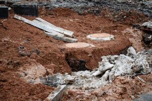 On a construction site, there is a significant accumulation of dirt and rocks that have been gathered and piled up, showcasing the geological phenomenon of soil excavation and geology photo