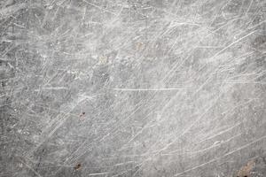 scratched metal sheet with visible texture. background photo