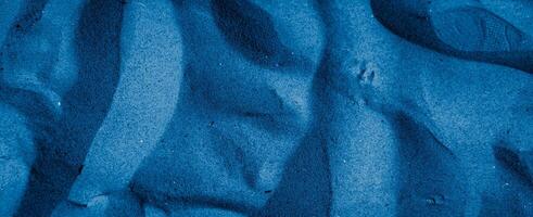 blue sea sand with visible details. background or texture photo