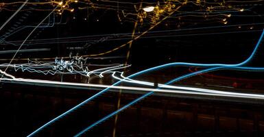 colored lines on a black background. textura photo