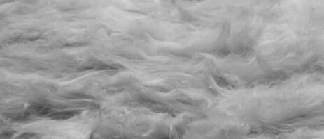 white wool with a visible texture. background photo