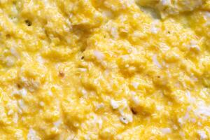 scrambled eggs with a visible texture. background. photo