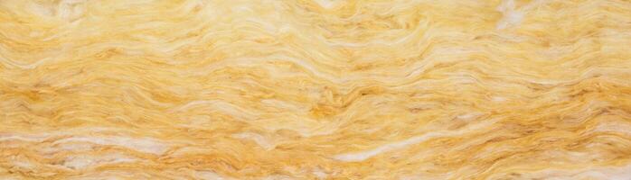 yellow mineral wool with a visible texture. background photo