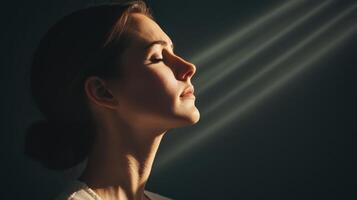 Calm reflection of a woman in soft light background indoor portrait photography peaceful environment photo