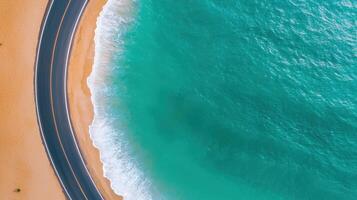 Coastal drive along serene beach aerial view vibrant ocean background peaceful environment photo