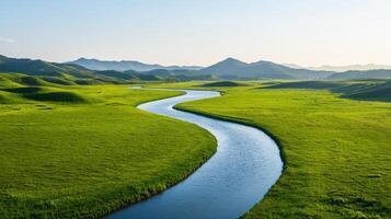 Winding river flowing through lush green hills scenic landscape background nature photography peaceful environment photo
