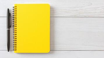 Creative workspace essentials home office notebook and pen minimalist background top-down view productivity concept photo