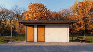 Modern restroom facility amidst vibrant autumn trees urban park architectural design clear background photo