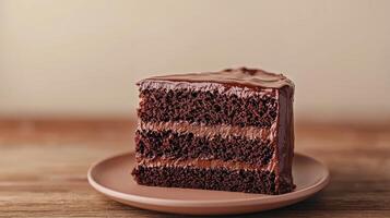Delicious chocolate cake slice with smooth frosting home kitchen background food photography warm lighting dessert concept photo