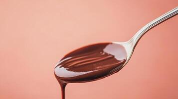 Drizzling chocolate sauce kitchen food photography close-up smooth background culinary art photo