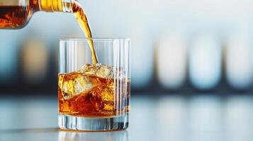 Pouring whiskey over ice in a glass modern bar background beverage photography stylish environment photo