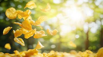 Falling yellow potato chips in a sunlit forest background nature photography vibrant outdoor environment photo
