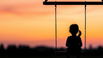 Child on swing against sunset background outdoor playground silhouette peaceful environment emotional viewpoint photo