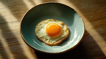 Fried egg cooking process kitchen food photography bright background close-up view culinary delight photo