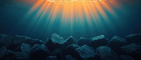 Underwater sunbeams illuminate rocky bottom nature's background ocean environment tranquil viewpoint photo