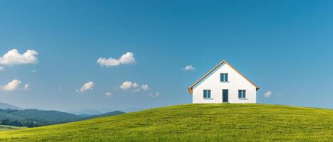 Serene house on green hill nature background landscape photography clear sky tranquil viewpoint photo