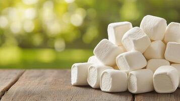 Delicious marshmallows piled up in nature's background food photography outdoor setting close-up view photo