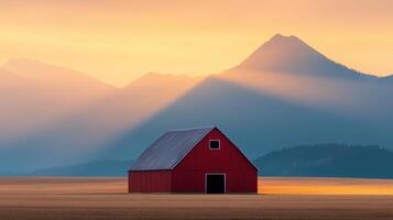 Rustic red barn against majestic mountain nature background photo