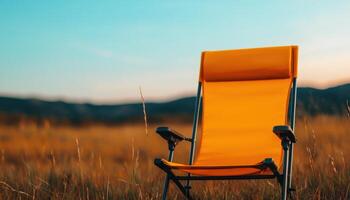 Bright Yellow Camping Chair Against Scenic Nature Background with Copyspace photo