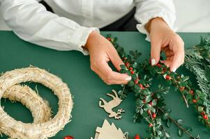 Making christmas wreath at home photo