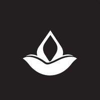 A white lotus flower icon on a black background vector