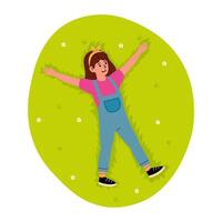 Girl enjoying a sunny day while making snow angels on green grass in a park vector