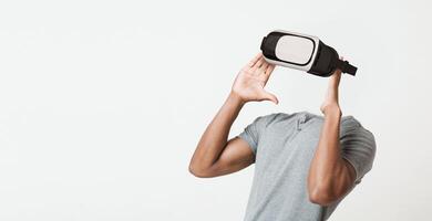 A user engages with a virtual reality headset, immersing into new experiences. The modern gadget emphasizes innovation in technology, showcasing advancements in virtual interaction. photo