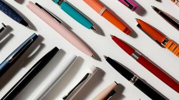 Assorted colorful pens arranged in a pattern photo