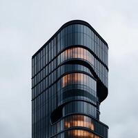 Modern skyscraper with curved facade photo