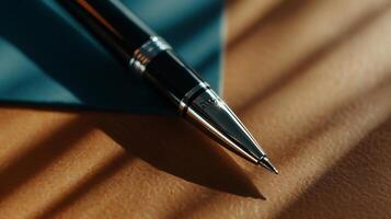 Close-up of a pen tip on paper photo