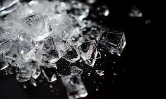 Close-up of broken ice cubes on a dark surface photo