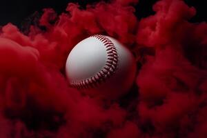Baseball ball in red smoke on black background photo
