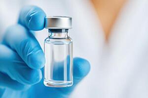 Close-up view of a scientist in a lab conducting an inspection of a peptide-based drug in a vial for clarity and quality assurance photo