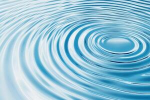 Soft icy blue water ripple creates a calming effect with gentle light reflections across the surface photo