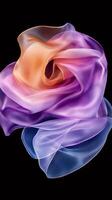 Smooth elegant colorful transparent chiffon fabric flowing on black background photo