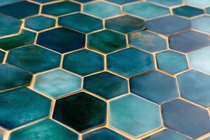 Emerald green and gold hexagon tiles creating beautiful honeycomb pattern photo