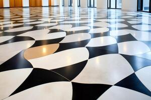 Shiny black, white and gold tiled floor creating an optical illusion in modern building photo