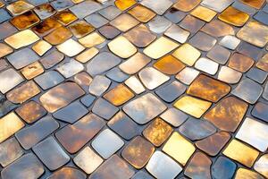 Shiny irregular tiles creating a colorful and textured pavement photo
