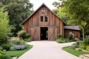 Charming rustic barn nestled in a lush garden setting with open doors inviting exploration photo