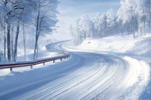 Snowy road winding through frosted trees in winter landscape photo