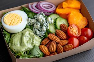 Delicious and nutritious salad in a takeaway box, perfect for a healthy lunch on the go photo