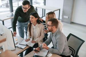 Unity ,of the people. Successful team are working together in the office. Conception of business photo