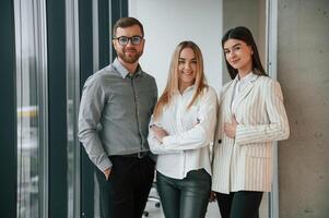Standing together. Successful ,team are working in the office. Conception of business photo