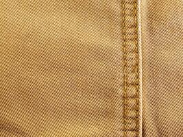 Surface Texture and seam of denim fabric photo