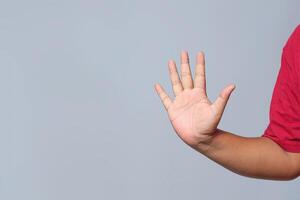 Open hand gesture showing stop sign, caution, and warning in communication photo