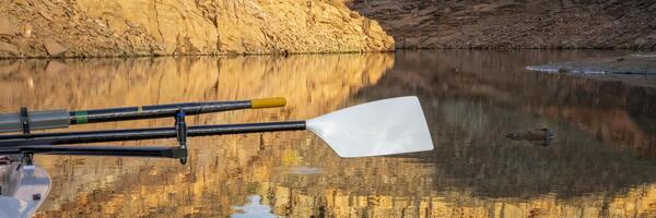 oars of sculling shell in sandstone canyon of Horsetooth Reservoir in Colorado in fall scenery photo
