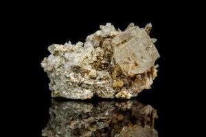 close-up Macro mineral stone fluorite with quartz against black background photo
